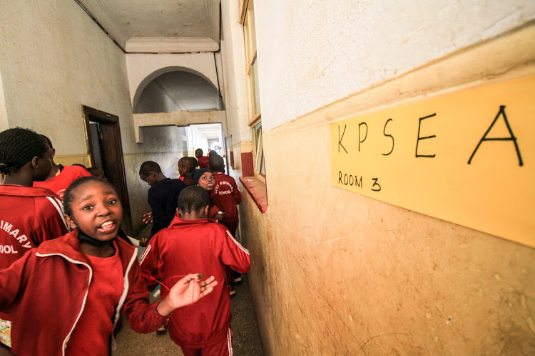 Learners walking in school after taking KPSEA exams